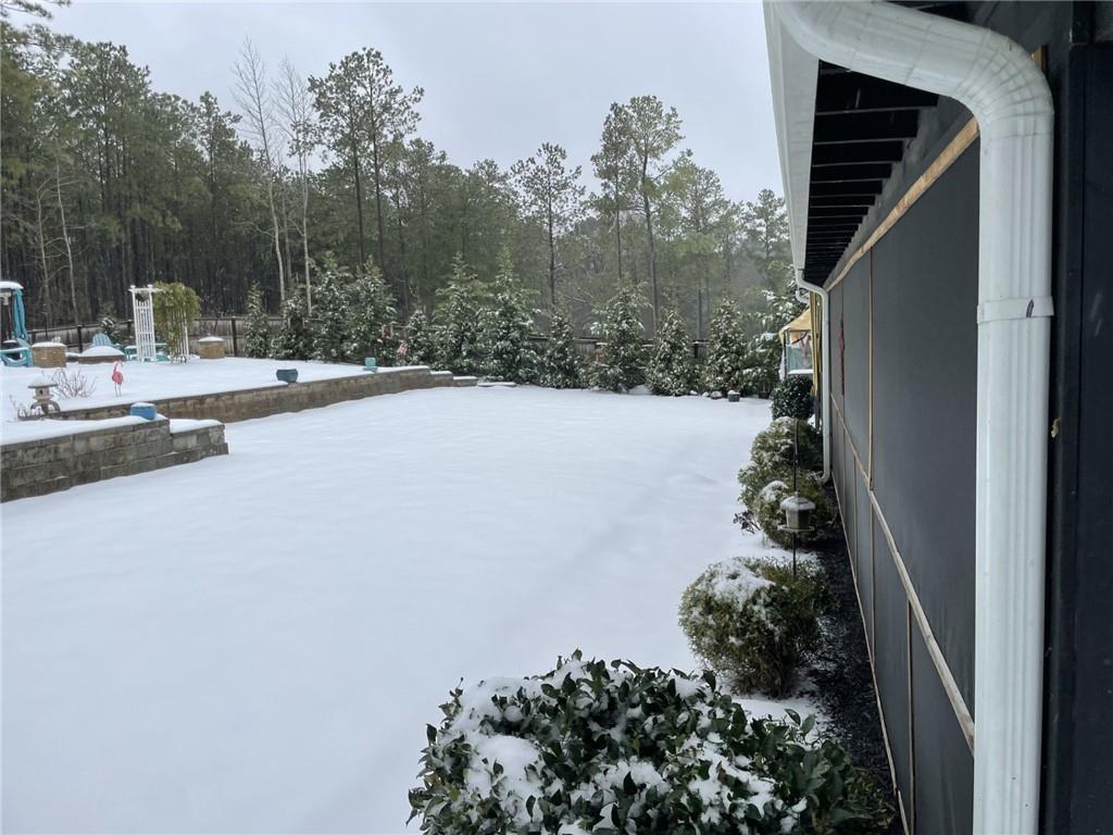 325 Tarpley Way Covington, GA 30016 - Photo 62 of 62 a backyard of a house with lots of green space