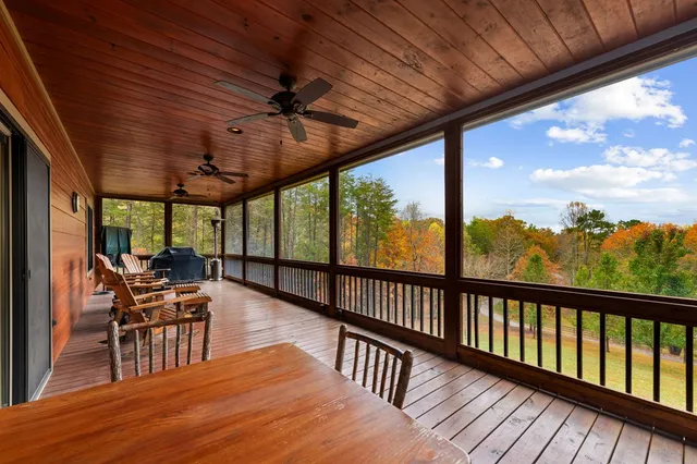 a view of a patio with wooden floor
