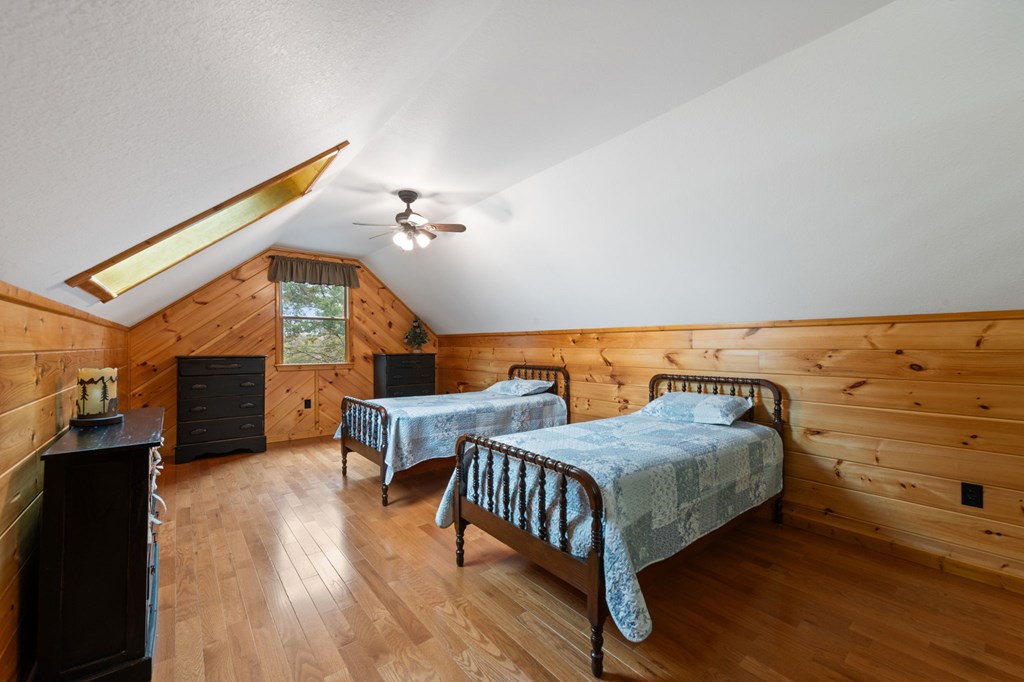34 Smokey Ridge Lane Morganton, GA 30560 - Photo 25 of 47 a bedroom with a bed and wooden floor