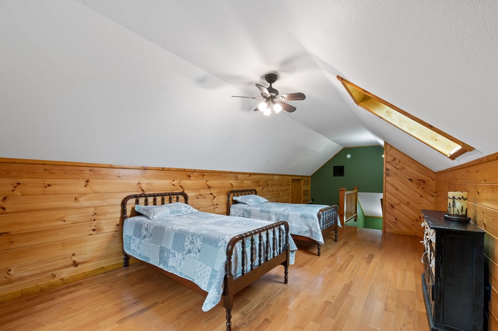 34 Smokey Ridge Lane Morganton, GA 30560 - Photo 26 of 47 a bedroom with furniture and wooden floor