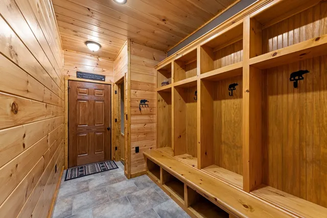 a bathroom with a shower and a sink