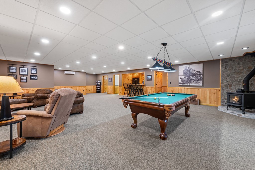 34 Smokey Ridge Lane Morganton, GA 30560 - Photo 28 of 47 a room with lots of furniture and a chandelier