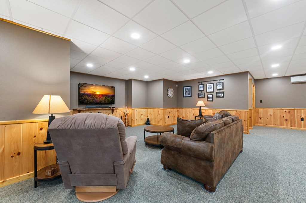 34 Smokey Ridge Lane Morganton, GA 30560 - Photo 30 of 47 a living room with furniture and a flat screen tv