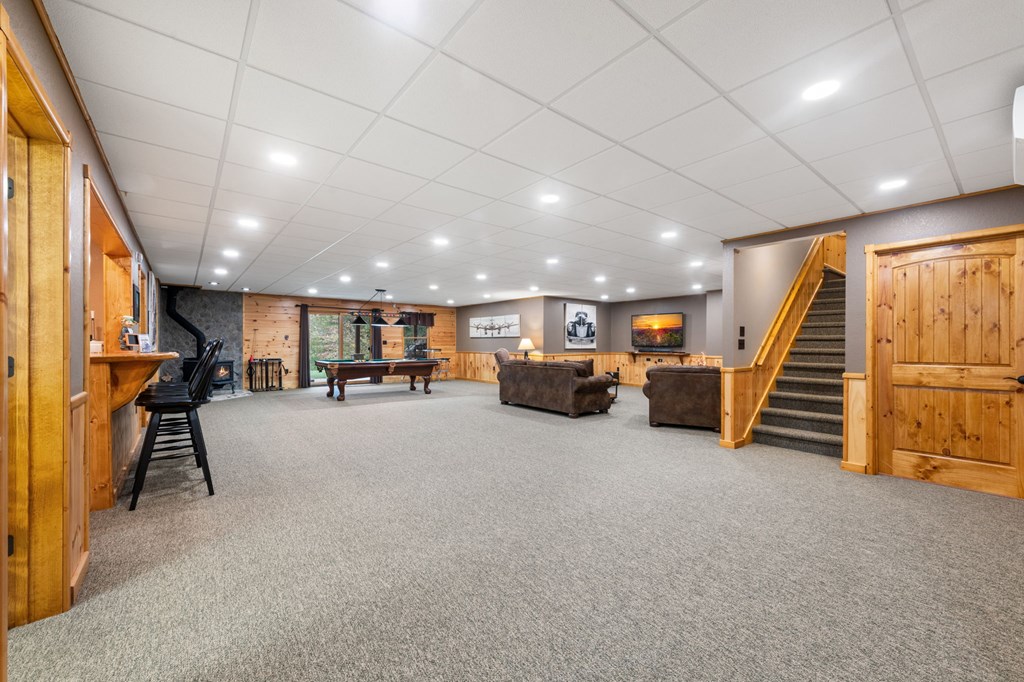 34 Smokey Ridge Lane Morganton, GA 30560 - Photo 34 of 47 a living room with furniture and a chandelier