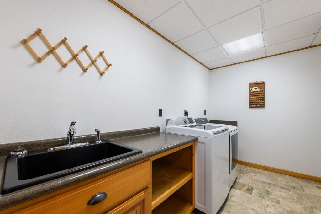 34 Smokey Ridge Lane Morganton, GA 30560 - Photo 39 of 47 a kitchen with a sink cabinets and wooden floor