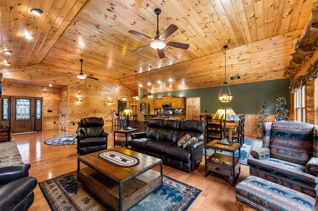 34 Smokey Ridge Lane Morganton, GA 30560 - Photo 6 of 47 a outdoor living space with furniture and a fireplace