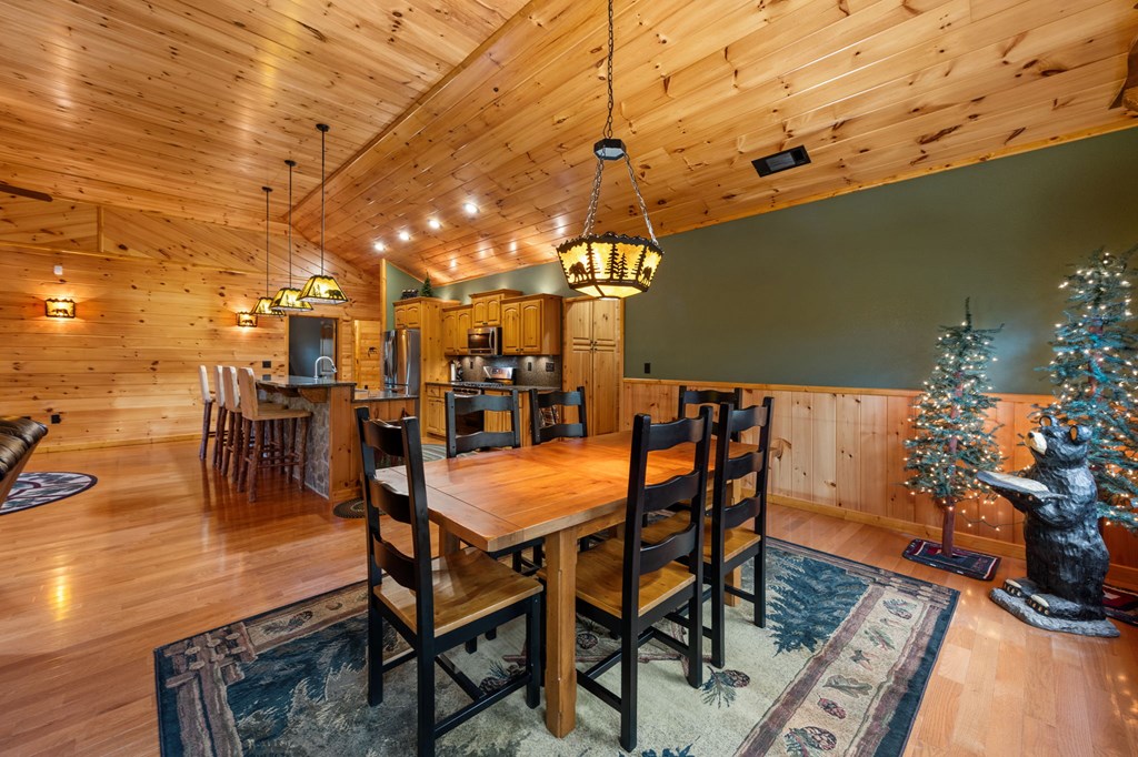34 Smokey Ridge Lane Morganton, GA 30560 - Photo 9 of 47 a dining room with furniture and wooden floor