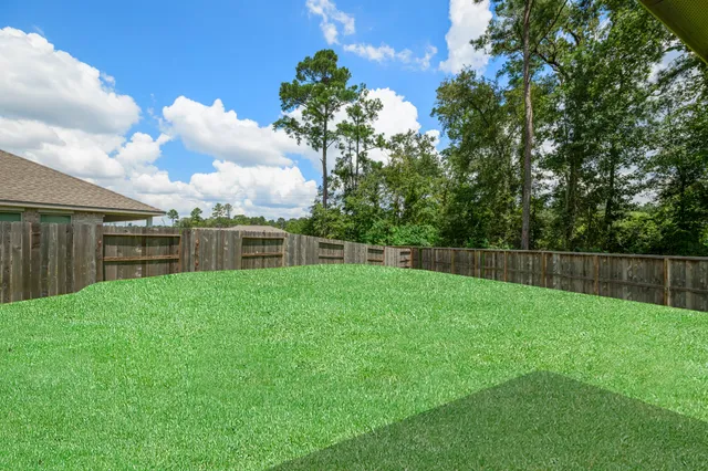 a view of a backyard with a garden