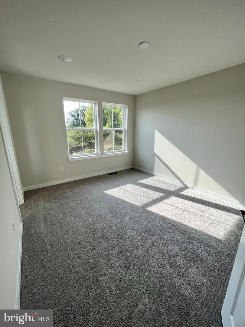 905 Magnolia Lane Spring City, PA 19475 - Photo 14 of 22 a view of an empty room with a window
