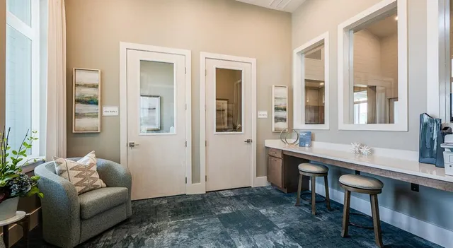 a living room with furniture and a table