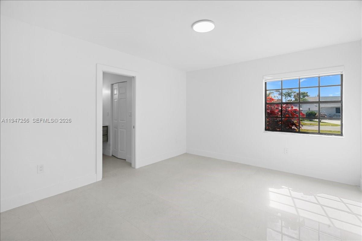 10351 Southwest 164th Street Miami, FL 33157 - Photo 6 of 19 a view of an empty room