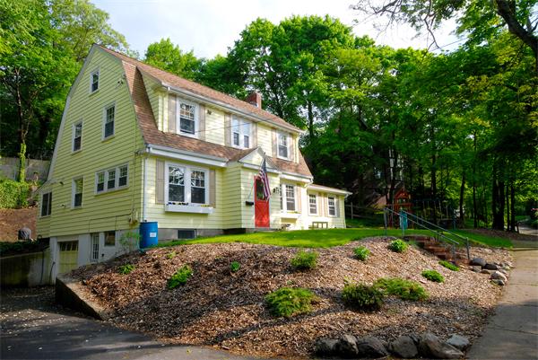 11 Westminster Road Newton, MA 02459 - Photo 3 of 26 a front view of a house with a yard