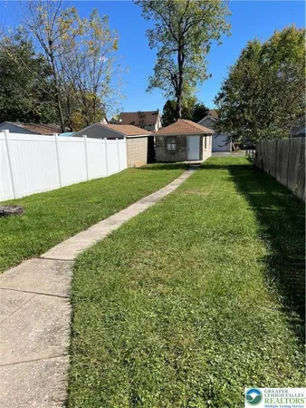 a house view with garden space