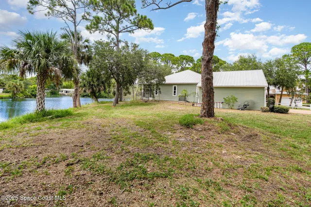 a backyard of a house with lots of green space