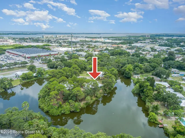 a view of a lake with a yard