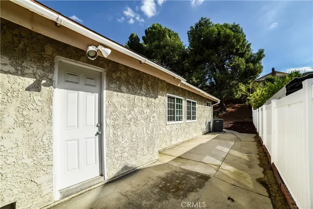 a house view with a backyard space