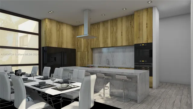 a kitchen with a sink and a stove top oven