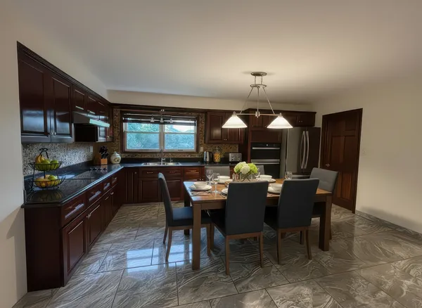 a kitchen with a dining table and chairs