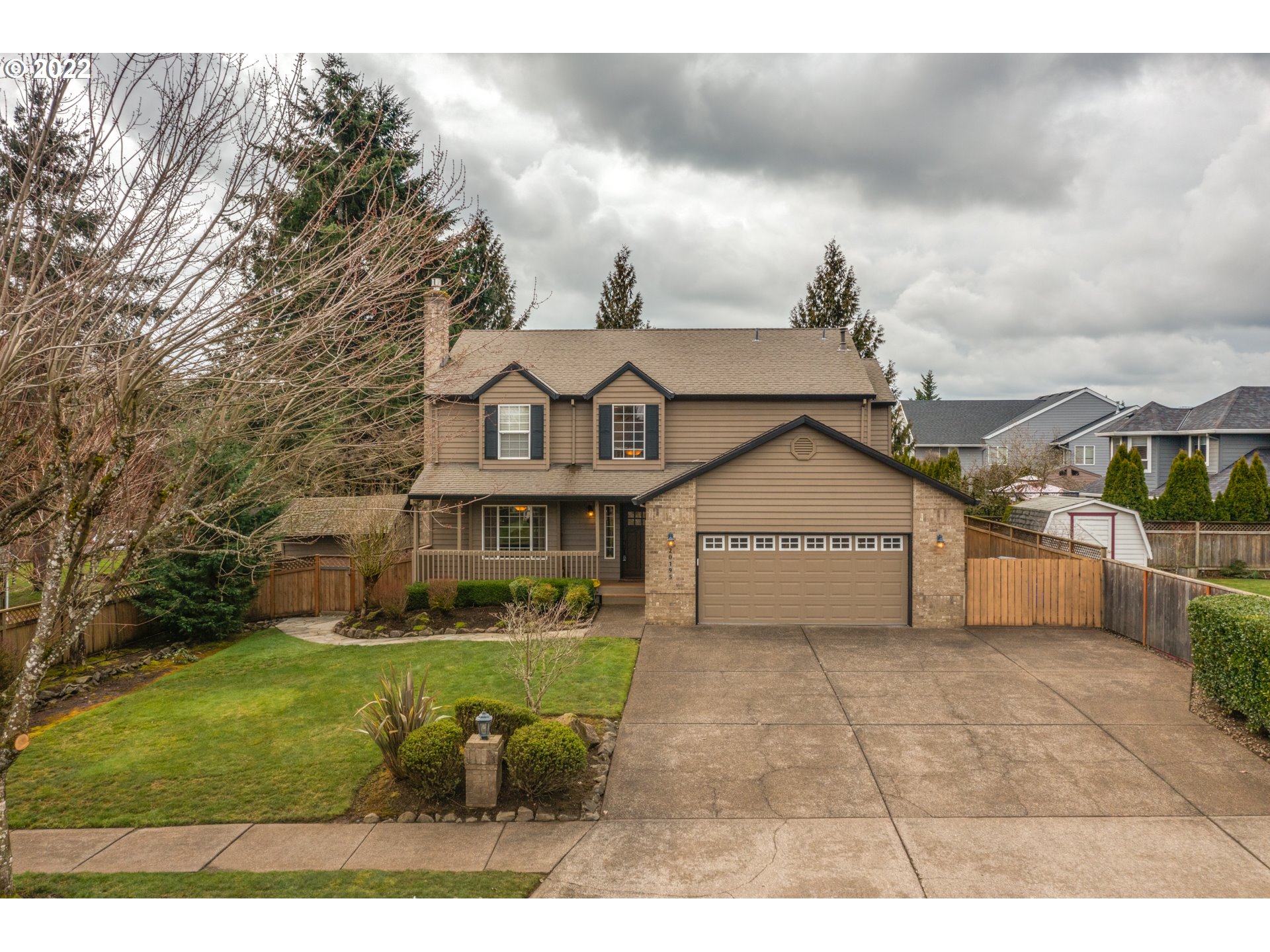 20195 Canyon Ridge Drive Oregon City, OR 97045 - Photo 1 of 24 a view of a big house with a big yard and potted plants