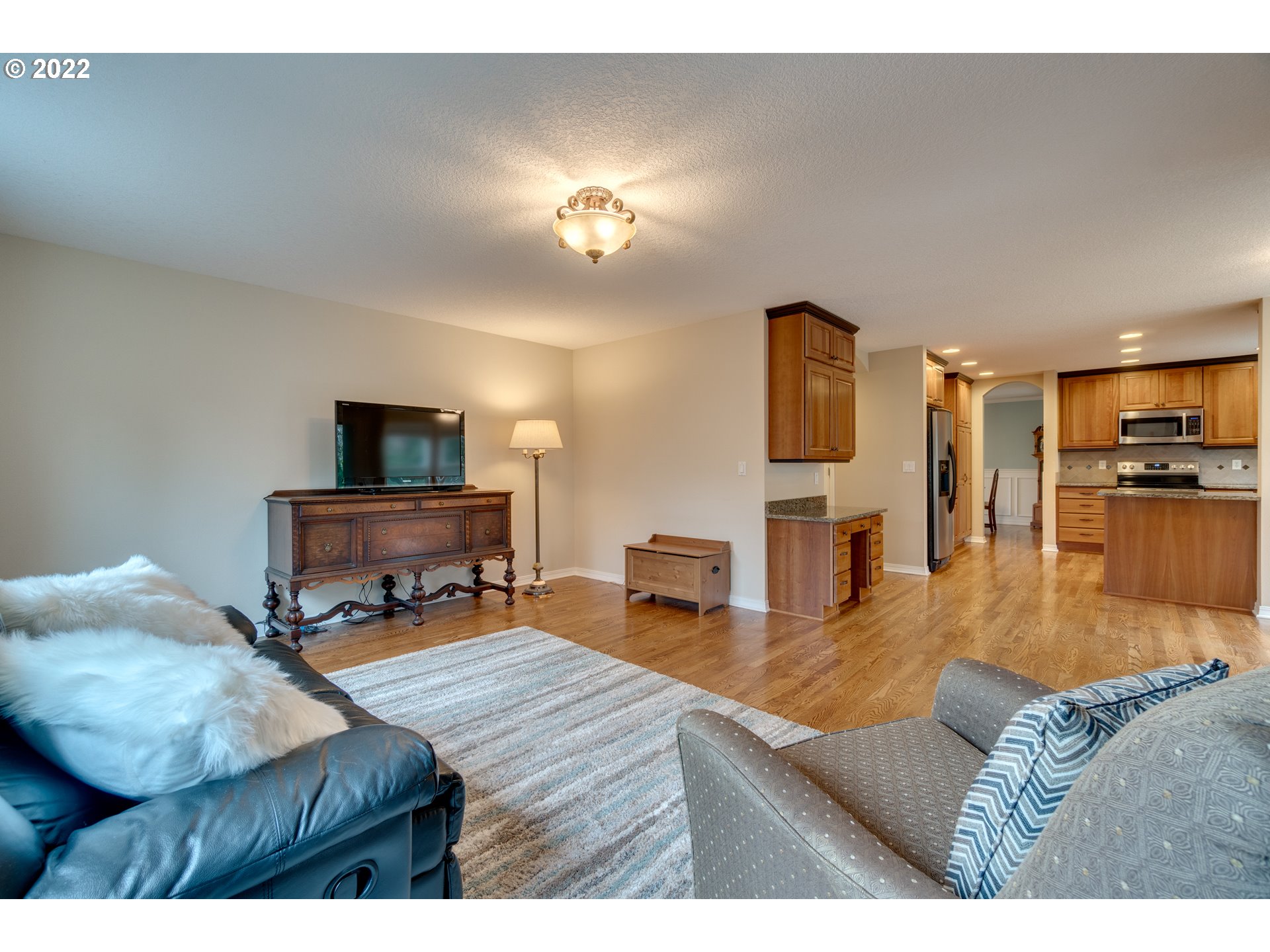20195 Canyon Ridge Drive Oregon City, OR 97045 - Photo 14 of 24 a living room with furniture and a flat screen tv