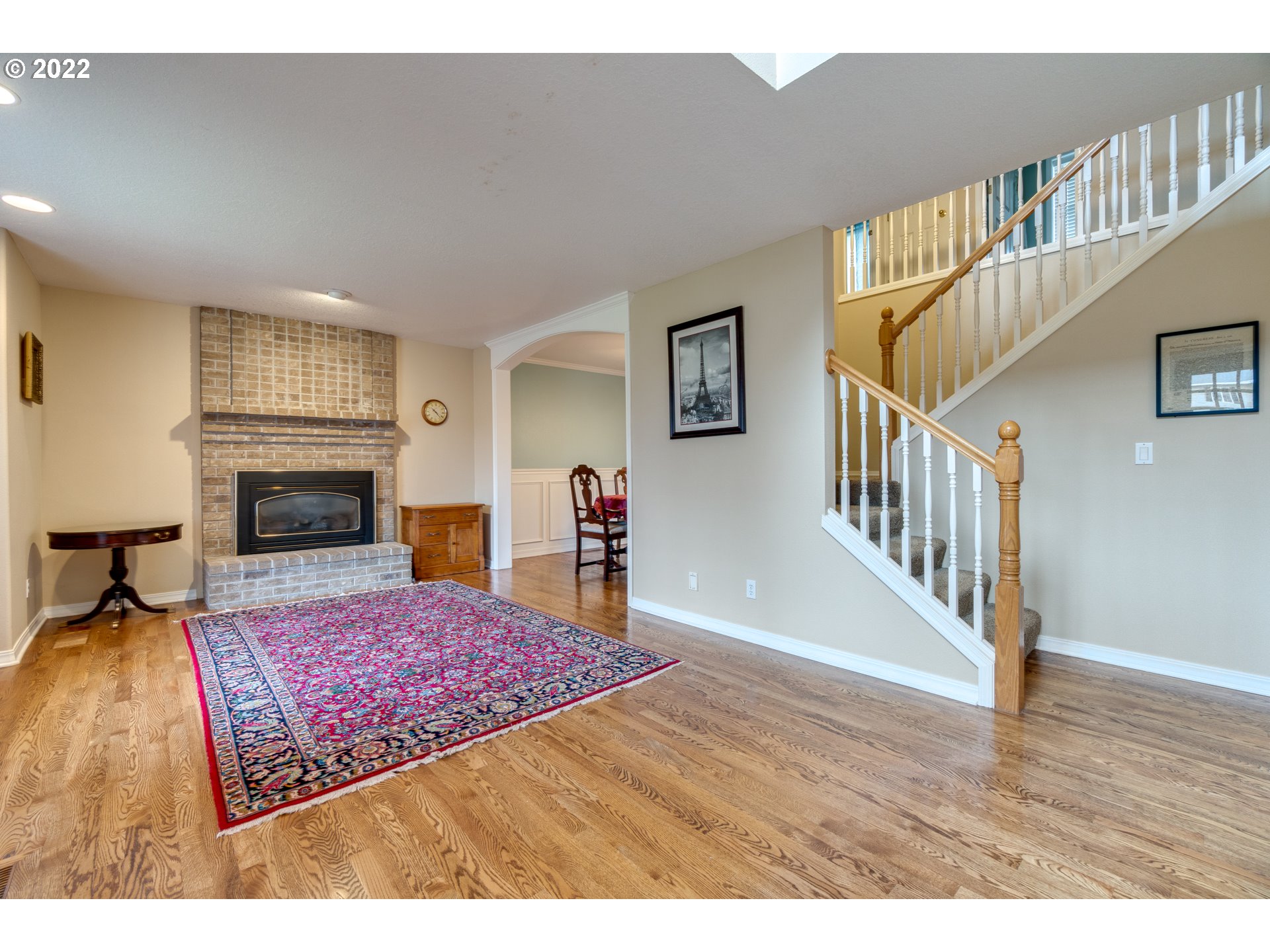 20195 Canyon Ridge Drive Oregon City, OR 97045 - Photo 15 of 24 a living room with wooden floor and a fireplace