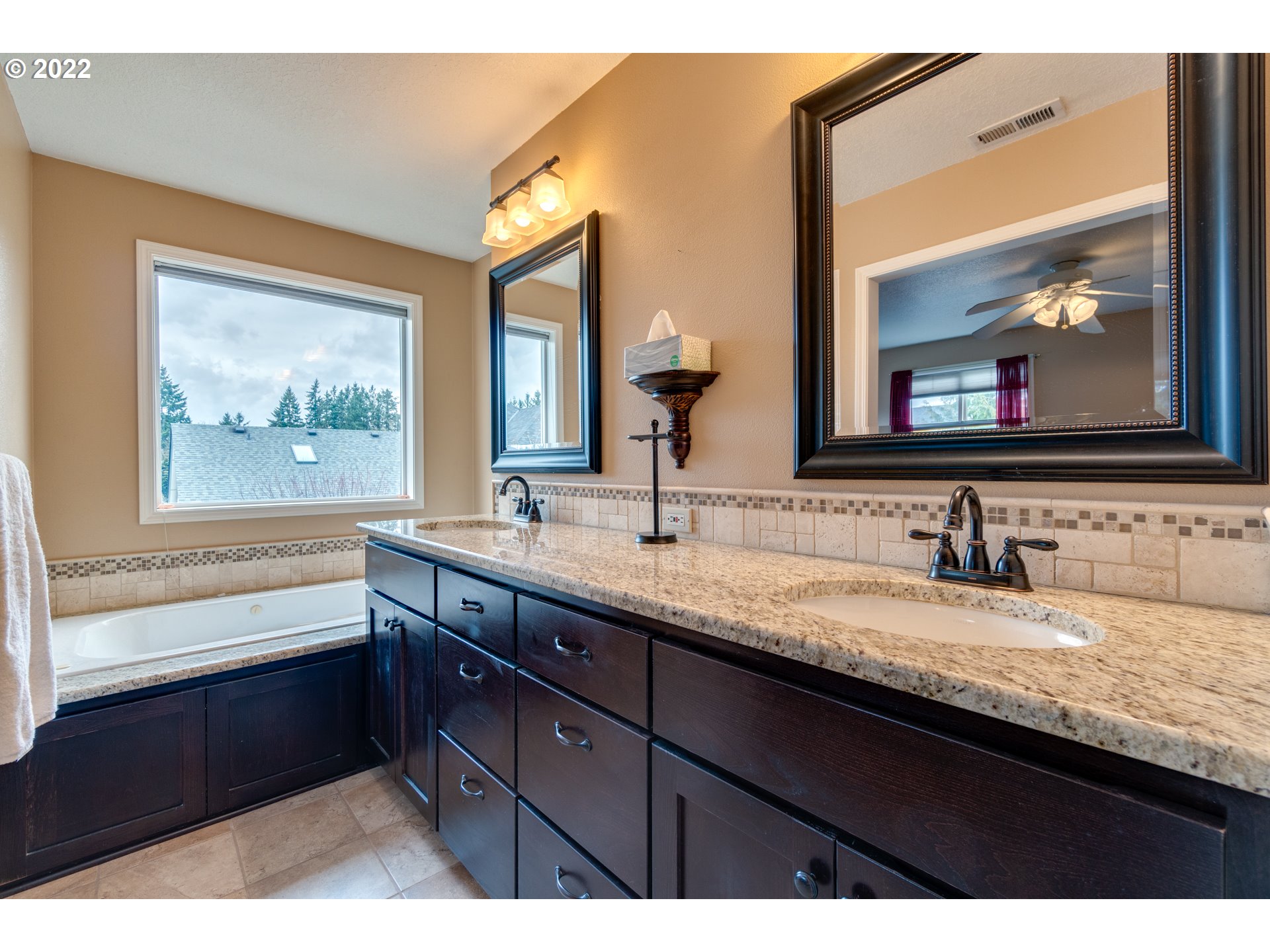 20195 Canyon Ridge Drive Oregon City, OR 97045 - Photo 18 of 24 a bathroom with a granite countertop sink mirror and double