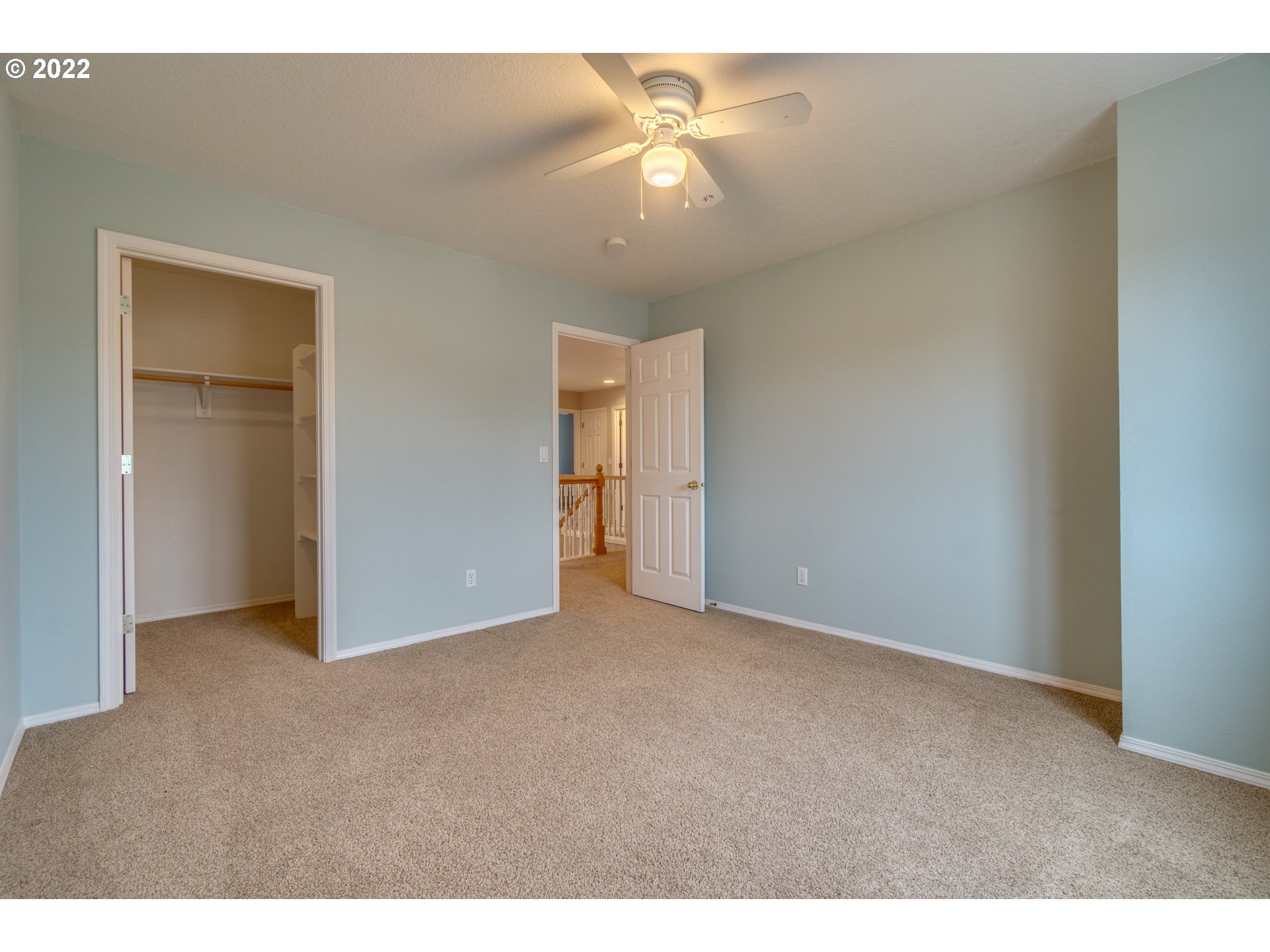 20195 Canyon Ridge Drive Oregon City, OR 97045 - Photo 19 of 24 a view of an empty room with a ceiling fan