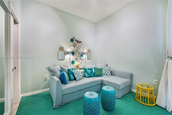 a living room with furniture and a table