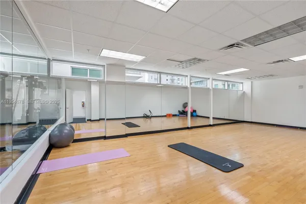 a view of a room with gym equipment