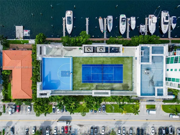 a view of multiple house with a yard