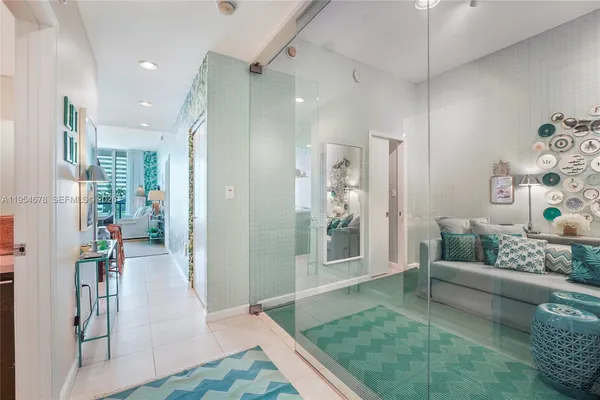 a living room with furniture and a table