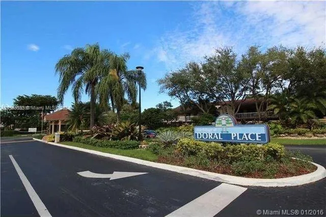 a bathroom with a toilet a sink and shower