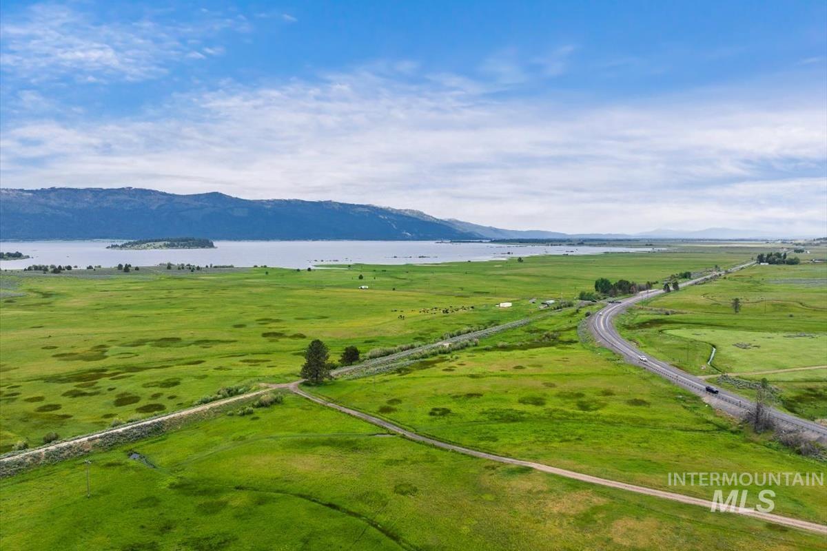 Mountain view with a large body of water and rural landscape