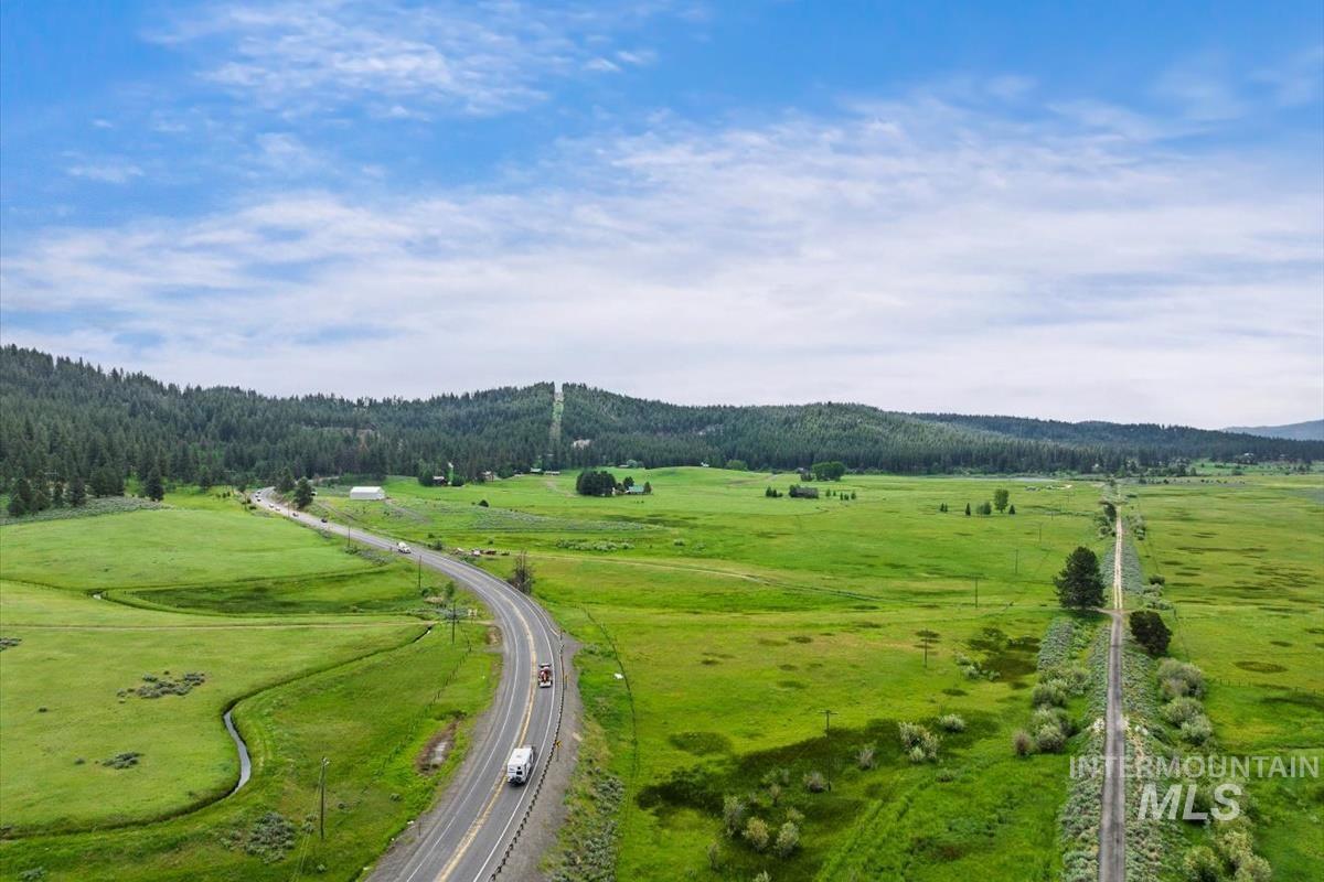 11 Stone Breaker Lane Cascade, ID 83611 - Photo 9 of 23 Drone / aerial view of a major roadway and a mountainous background