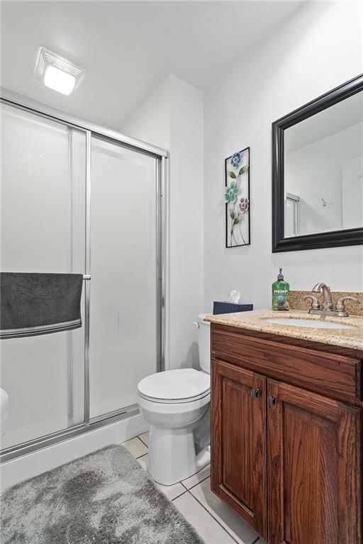 120-122 Green Brae Road Kittanning, PA 16201 - Photo 12 of 25 Secondary Full Bathroom is approx. 7x5 and located in the Hallway off of the 2nd Bedroom. This Full Bath offers a Stand Up Shower Stall with Frosted Glass Doors and updated Vanity & Fixtures and Ceramic Tile Flooring.
