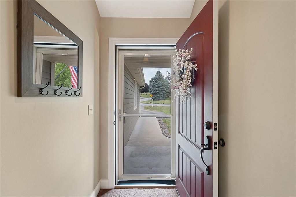 120-122 Green Brae Road Kittanning, PA 16201 - Photo 4 of 25 Sidewalks wind from the driveway to the Front Door. Upon entering the approx. 6x4 Entry, your guests will feel a warm invite with soothing tones and fresh decor throughout.