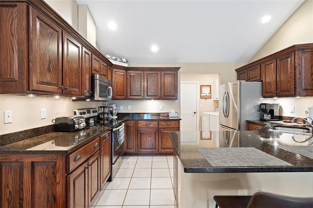 120-122 Green Brae Road Kittanning, PA 16201 - Photo 8 of 25 Offering plenty of room to move around and ample countertop space, feel like a master chef when preparing your meals. Under Cabinet Lighting also provides additional ambiance.