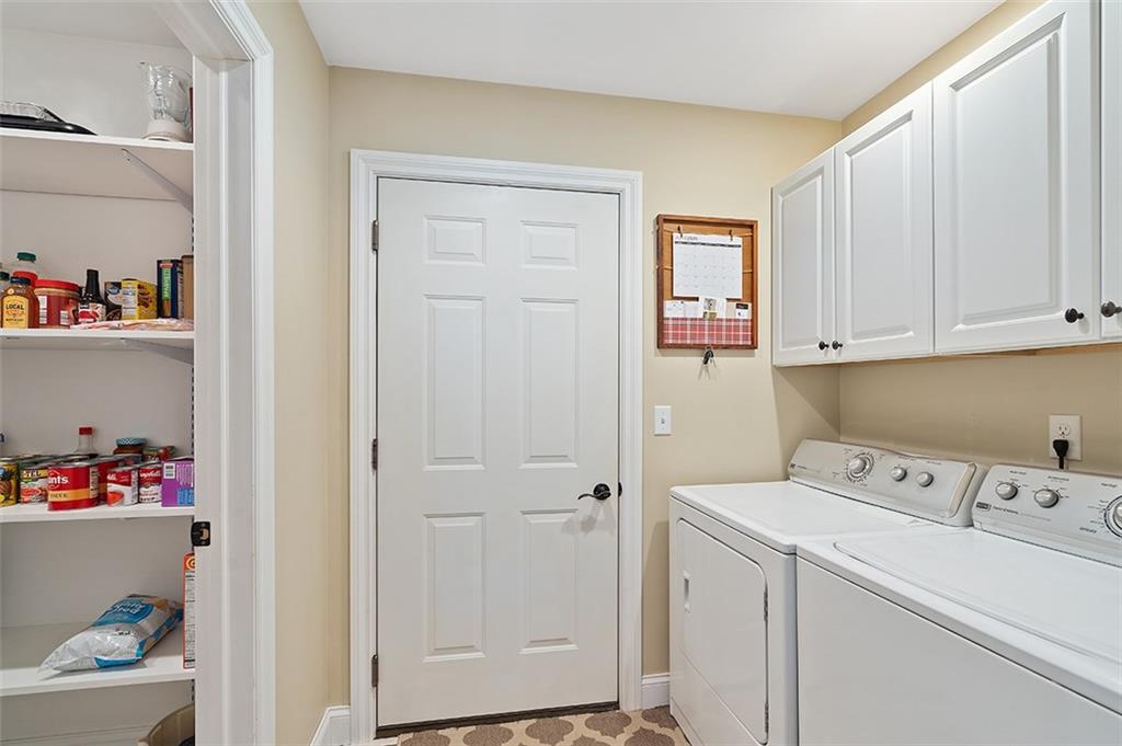 120-122 Green Brae Road Kittanning, PA 16201 - Photo 9 of 25 Off of the Kitchen is a Mud Room that connects to the 1 Car Attached Garage and includes Main Level Laundry and an approx. 6x5 Walk In Pantry for all your goodies!