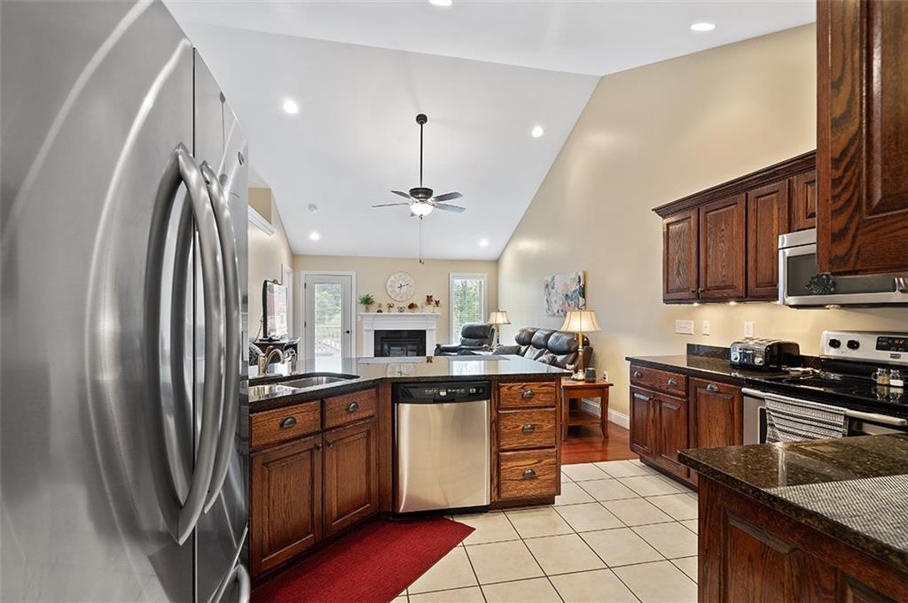120-122 Green Brae Road Kittanning, PA 16201 - Photo 10 of 25 Stainless Steel Appliances include: Maytag Refrigerator, Dishwasher, Electric Stove & Microwave. Kitchen also includes a Double Bowl Sink with Disposal.