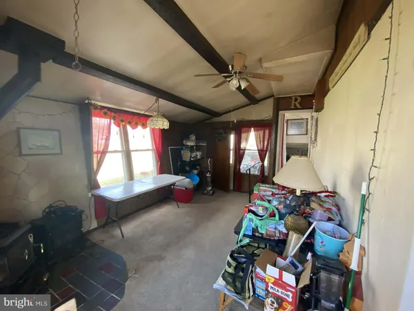 a bed room with furniture and a window