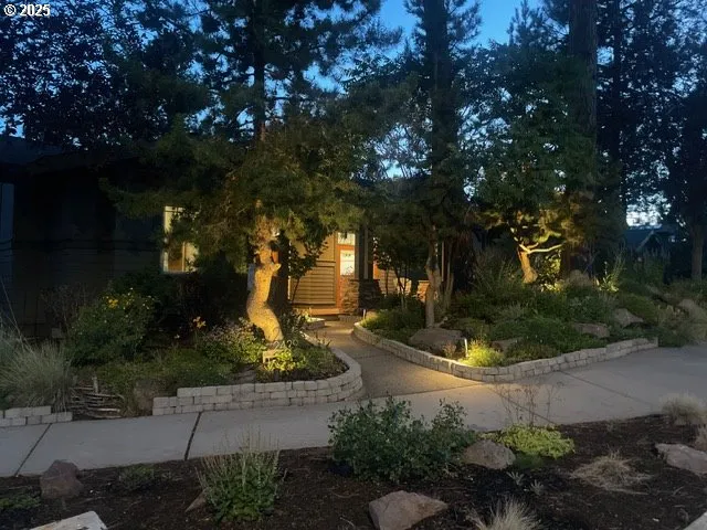 a view of a fountain of the house