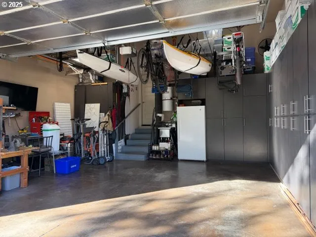 a view of a garage with wooden floor
