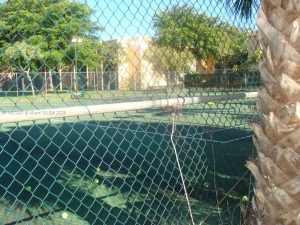 a view of a yard and bench