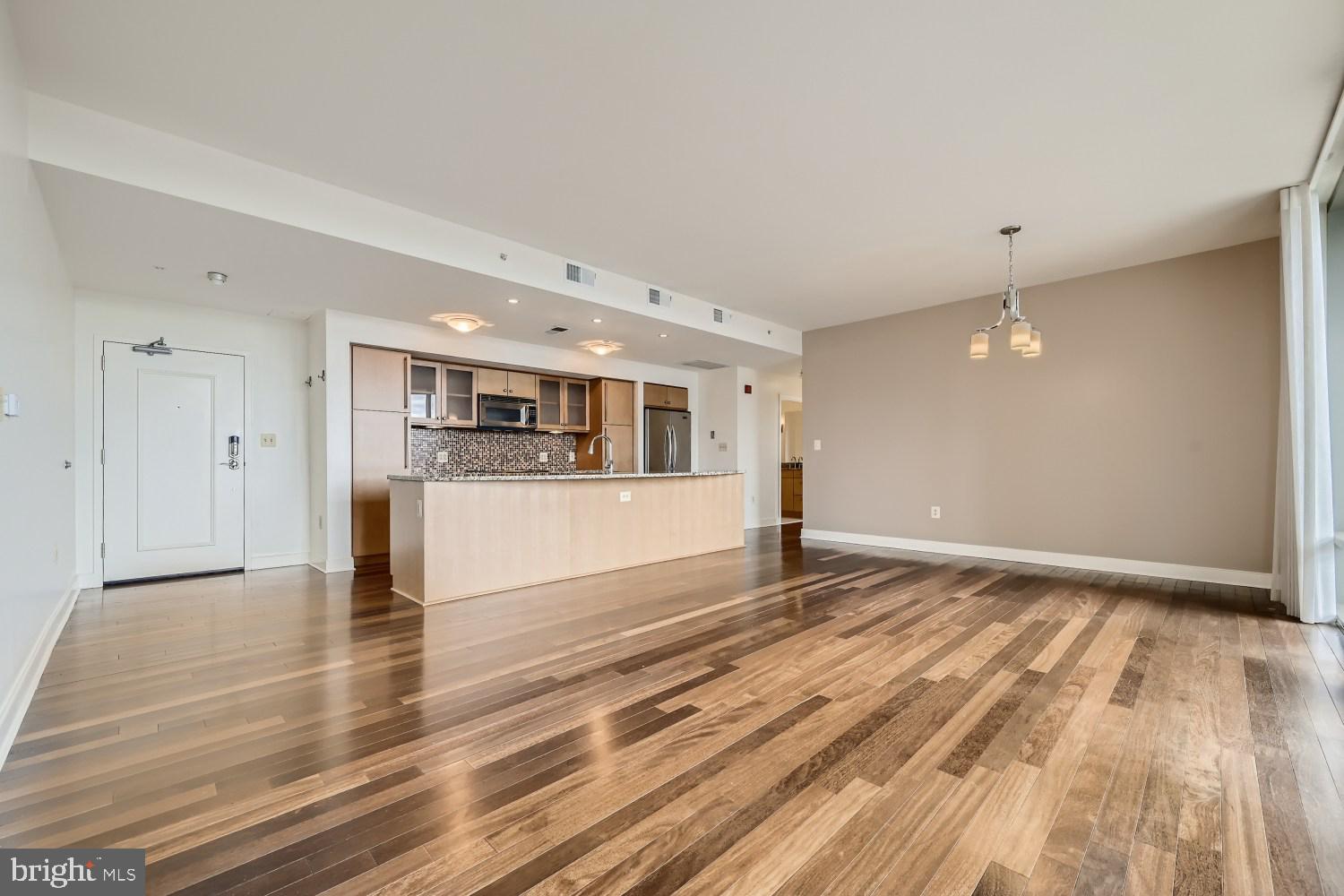 675 President Street, Unit 1709 Baltimore, MD 21202 - Photo 28 of 33 a view of empty room with wooden floor