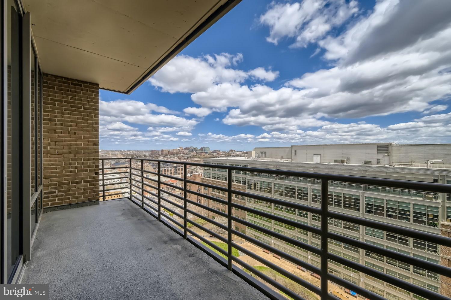 675 President Street, Unit 1709 Baltimore, MD 21202 - Photo 3 of 33 a view of a balcony with an outdoor seating