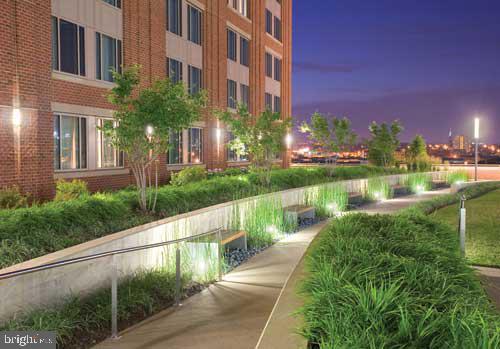 675 President Street, Unit 1709 Baltimore, MD 21202 - Photo 9 of 33 a view of a lake with a building in the background