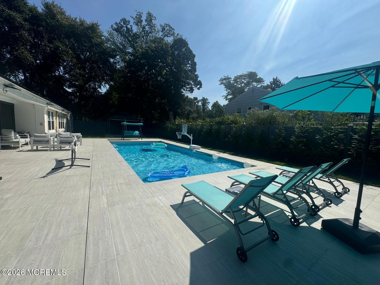 a view of backyard with hardwood