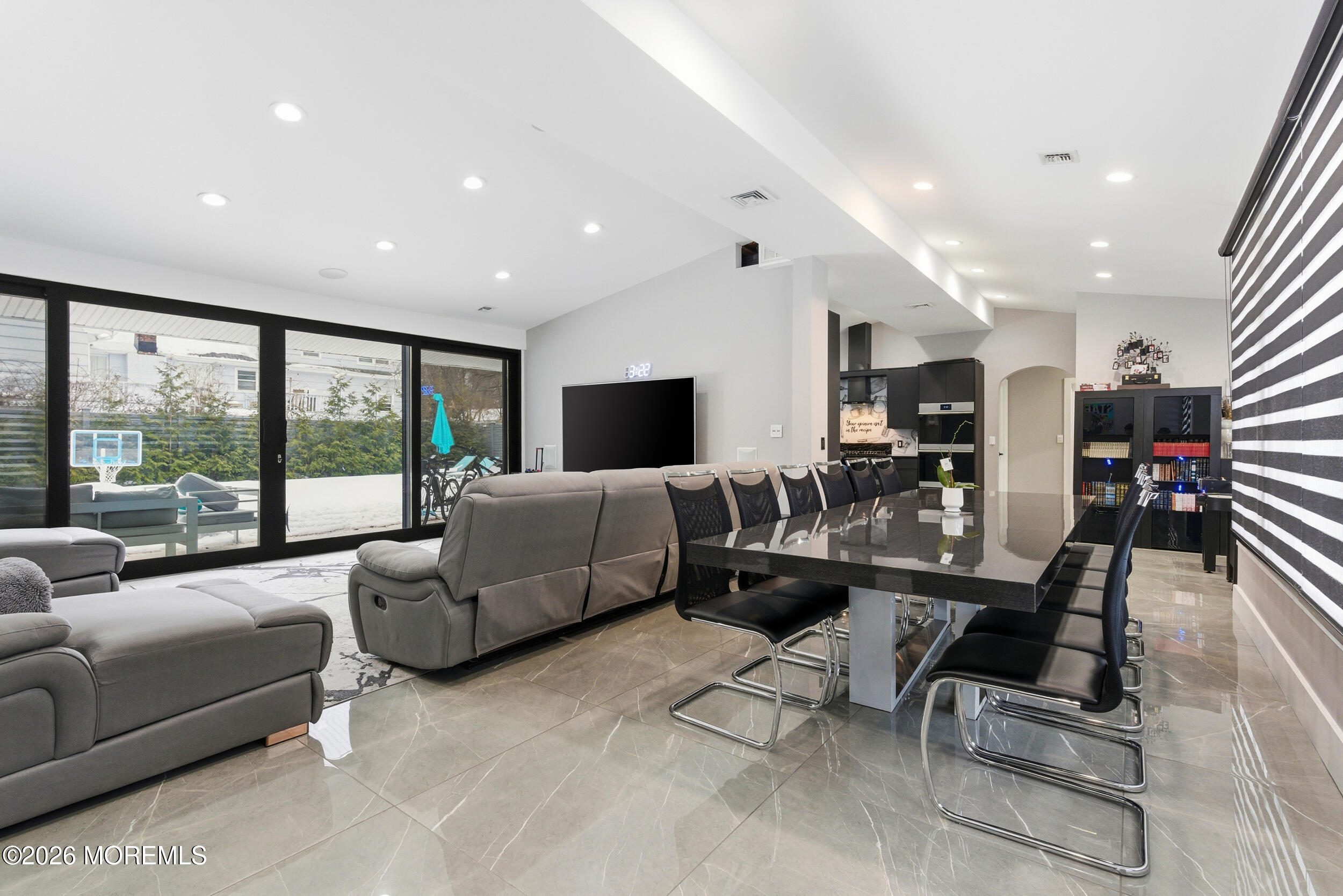 612 Deal Road Asbury Park, NJ 07712 - Photo 17 of 48 a living room with furniture and a flat screen tv
