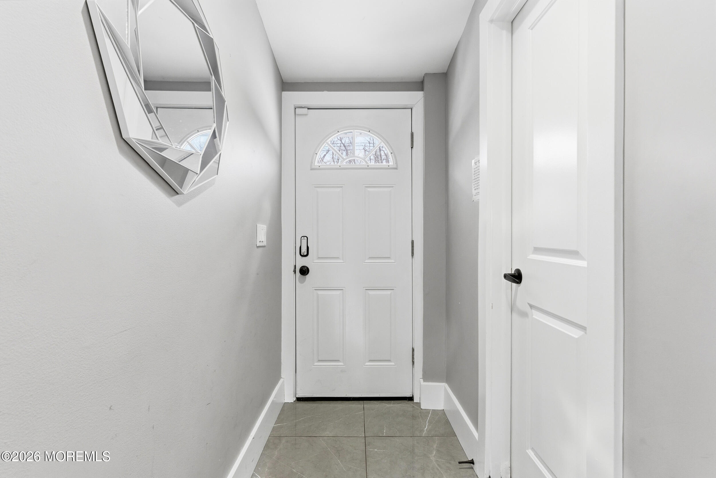 612 Deal Road Asbury Park, NJ 07712 - Photo 18 of 48 a view of an entryway with wooden floor