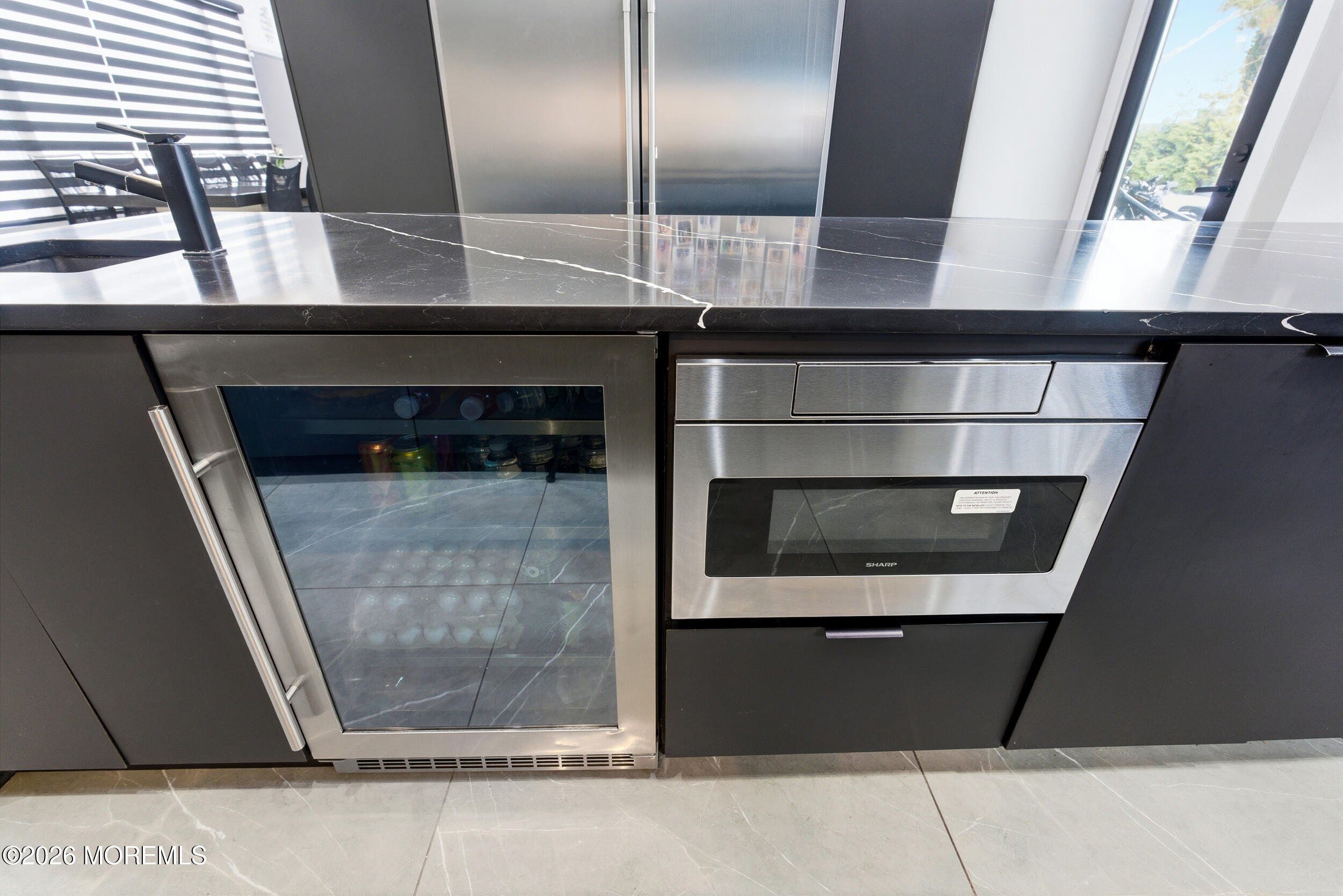 612 Deal Road Asbury Park, NJ 07712 - Photo 8 of 48 a bathroom with a glass door shower and sink